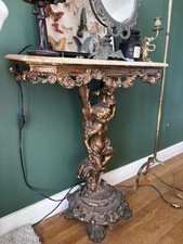 Console rectangulaire style baroque putto bois sculpté doré, plateau marbre